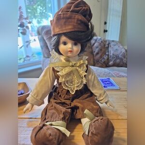 Vintage Brown and Cream Porcelain Doll with Accessories